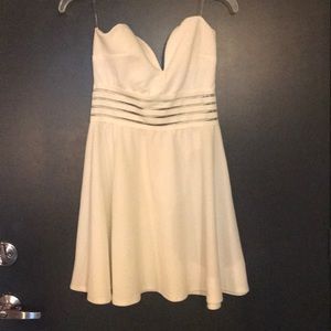 White strapless v neck dress.
